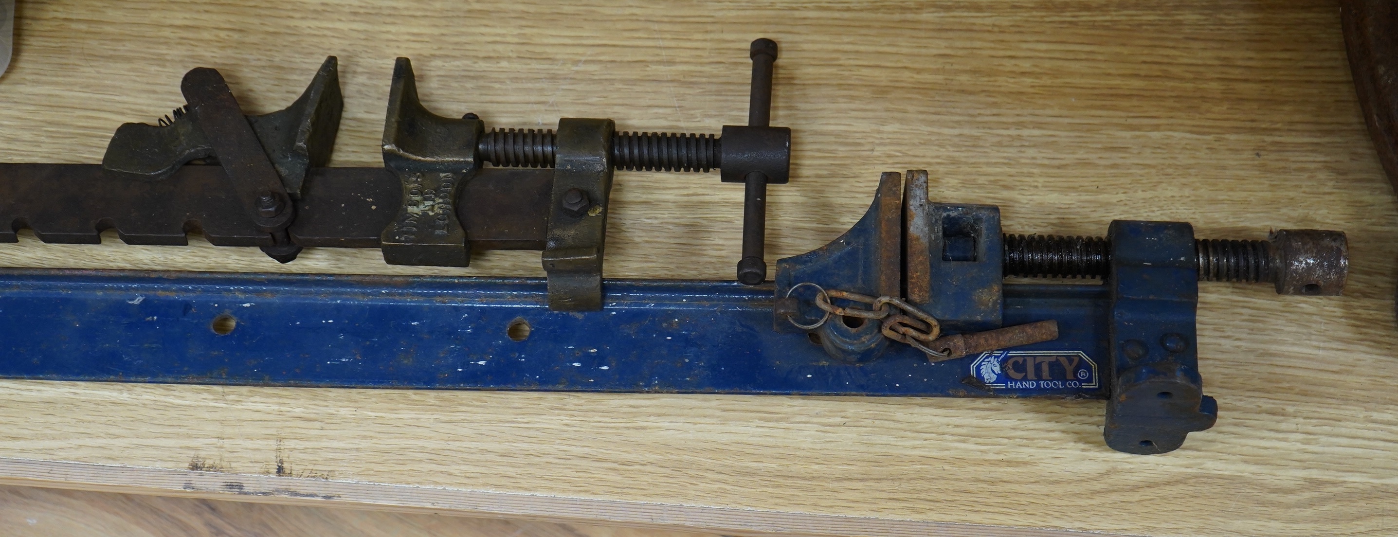 A Victorian Timbois Ltd. ratchet clamp and another. Condition - fair